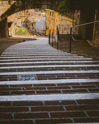 Steps through history
Perugia, Italy | August 2022

#steps #leadinglines #perspective #diminishingperspective #perugia #italy #italia #hiddenitaly #urban #street #urbanstreets #streetphotographyinternational #rawurbanshots #streetleaks #urbanaesthetics #streetfinder #travelphotography #traveldeeper #travelbug #passionpassport #travelwithme #exploretocreate #neverstopexploring #livetoexplore #wanderlust #discoverearth #shotoniphone #soulcollective #choosingouradventure #jfphototribute